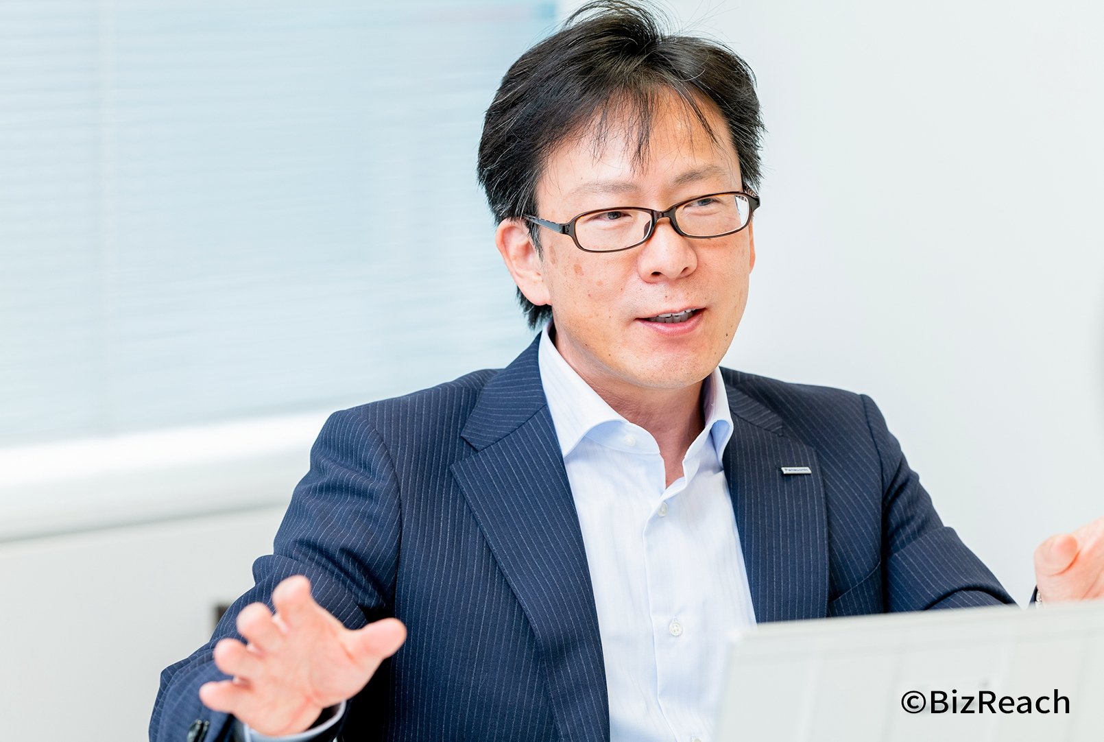 説明する林さん