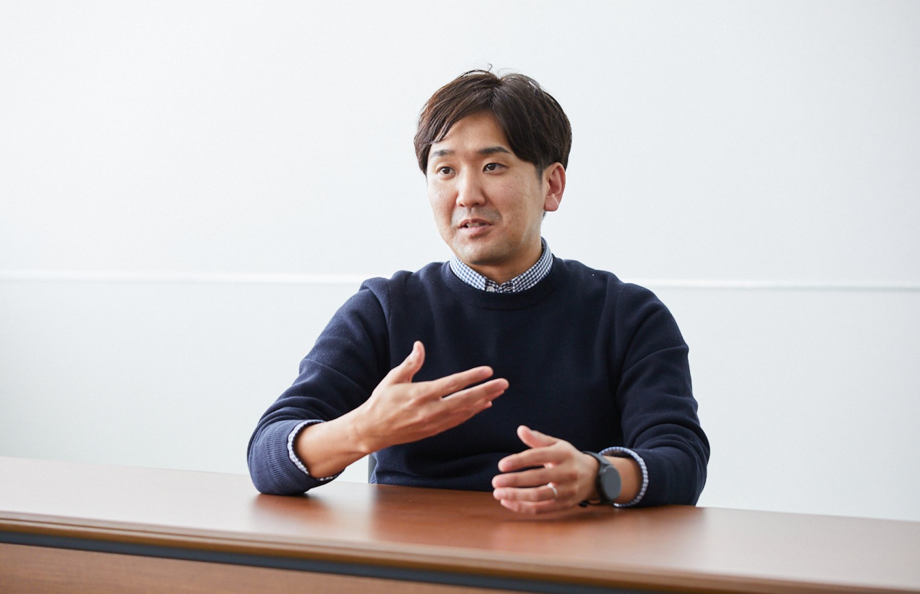 インタビューを受けるO.Tさん