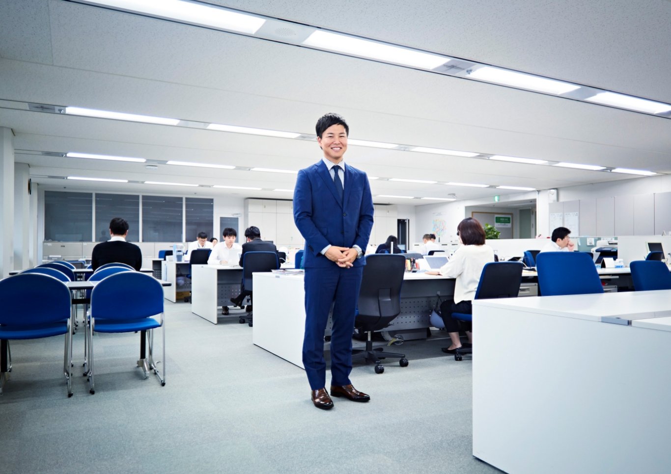 仕事場と吉坂 悠司さん