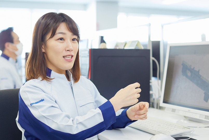 笑顔で語る李 強麗さん