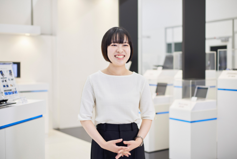 笑顔の飯塚さん